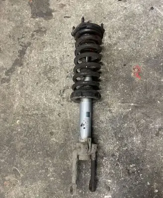 Jeep Grand Cherokee (WK) Front shock absorber with coil spring 32140117