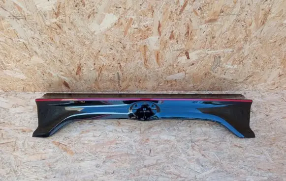 Toyota Yaris XP210 Trunk door license plate light bar 76801-K0120