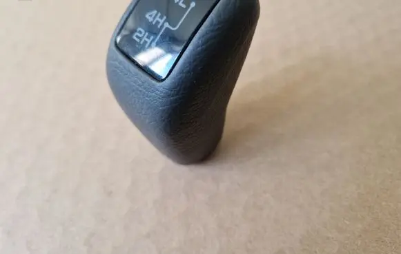 Mitsubishi Pajero Sport I Gear lever shifter trim leather/knob 