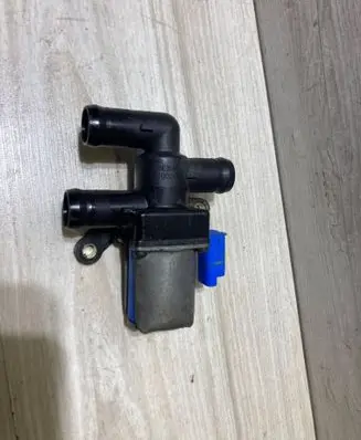 Coolant heater control valve