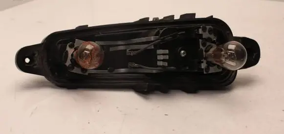 Tail light bulb cover holder