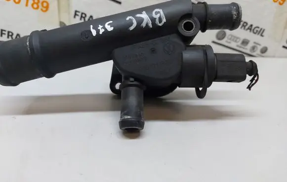 Thermostat/thermostat housing