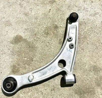 Mitsubishi Lancer Evolution Front lower control arm/wishbone MR554813