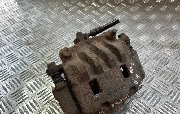 Subaru Impreza III Front brake caliper