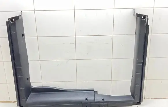 Trunk/boot lower side trim panel