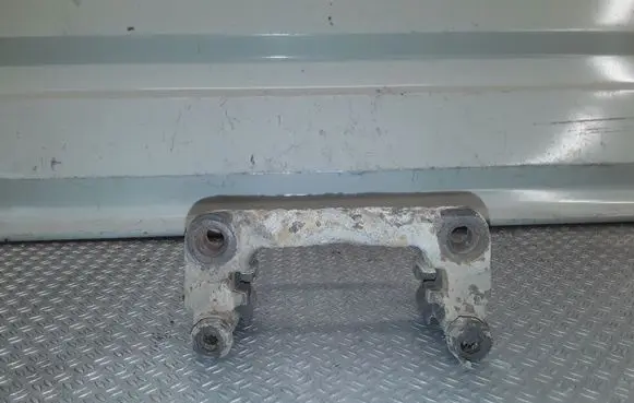 Nissan X-Trail T30 Brake caliper pad carrier rear 