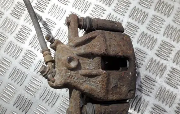 Nissan Note (E11) Front brake caliper