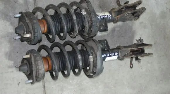 Honda Civic IX Front shock absorber with coil spring NH737M 120KM