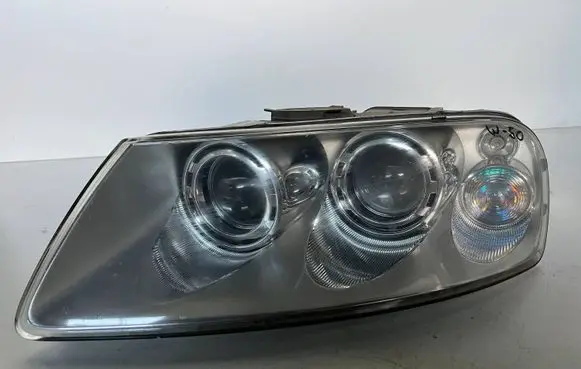 Volkswagen Touareg I Headlight/headlamp 7L6941015BK 89307851 1102A5394