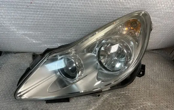 Opel Corsa D Headlight/headlamp 13186381 89313290