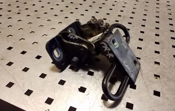 Front door lower hinge