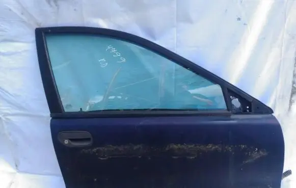 Volvo S40, V40 Front door melyna