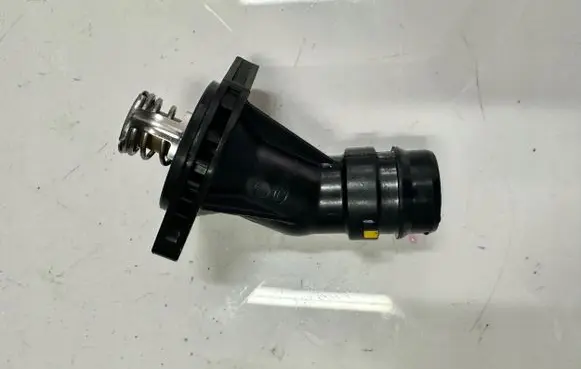 Thermostat/thermostat housing
