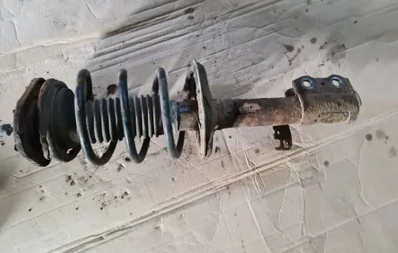 Toyota Corolla E120 E130 Front shock absorber with coil spring