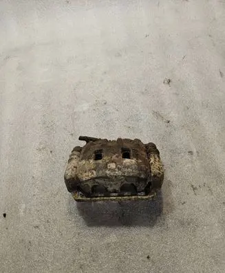 Subaru Forester SF Front brake caliper