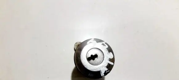 Mazda 121 Front door lock (next to the handle) 