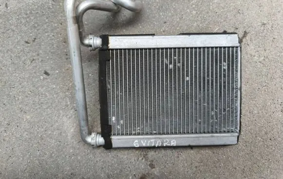 Suzuki Grand Vitara I Heater blower radiator 7412064J91