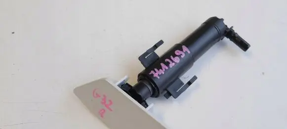 Headlight washer spray nozzle