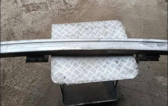 Cadillac DeVille Rear bumper support beam 25659775
