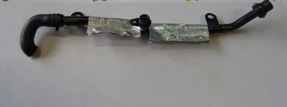 Volkswagen Golf VII Engine coolant pipe/hose 06L121085M