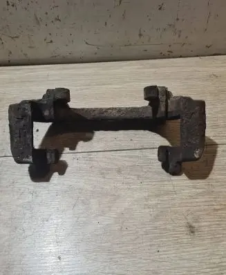 Volvo S80 Front Brake Caliper Pad/Carrier 