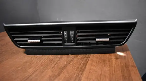 Porsche Cayenne (9Y0 9Y3) Dash center air vent grill 9Y0820701D