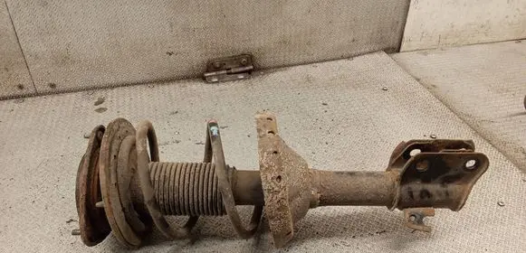 Subaru Legacy Front shock absorber with coil spring 