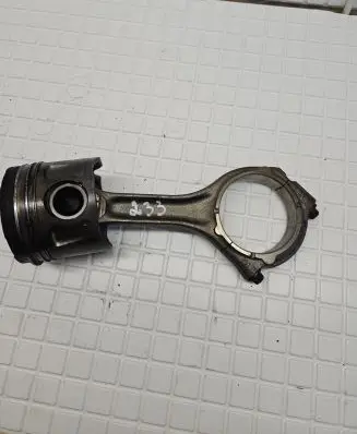 Piston with connecting rod