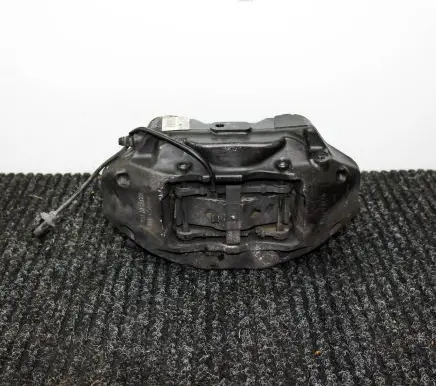 Volkswagen Touareg II Front brake caliper 7P6615106AF