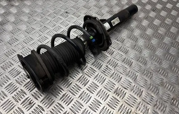 Skoda Octavia Mk3 (5E) Front shock absorber with coil spring 5Q0413023GK 5Q3412014B