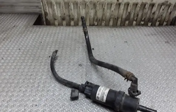 Opel Zafira B Headlight washer pump 90508709