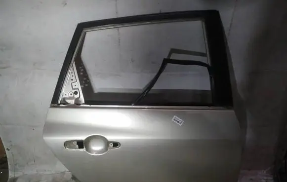 Mazda 3 I Rear door pilkos