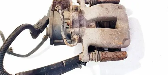 Volkswagen PASSAT B6 Rear brake caliper 