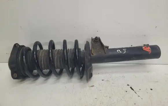 Volkswagen Caddy Front shock absorber with coil spring