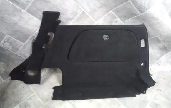 Trunk/boot lower side trim panel