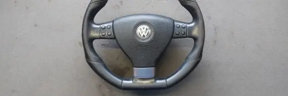 Volkswagen Scirocco Steering wheel 1K8419091K 1K0880201BT