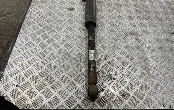 Opel Astra J Rear shock absorber/damper 13412740