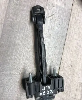 Front door check strap stopper