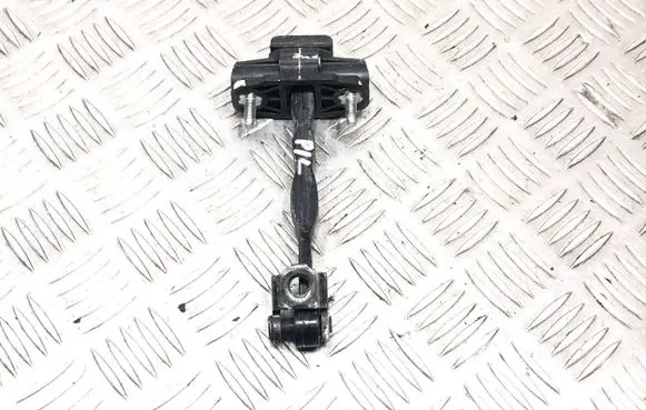Front door check strap stopper