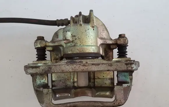 Mitsubishi Carisma Front brake caliper 32326112