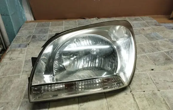 KIA Sportage Headlight/headlamp 921011F0