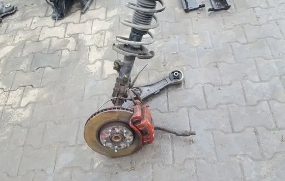 Front wheel hub spindle knuckle