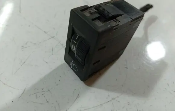 Headlight level height control switch