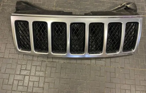 Jeep Grand Cherokee (WK) Front bumper upper radiator grill 11009G48992 EVV6937 ASSY6938