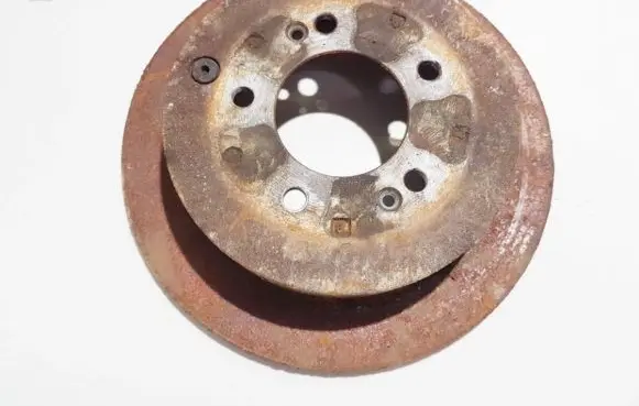 KIA Sportage Rear brake disc neventiliuojamas