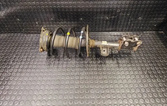 Front shock absorber with coil spring