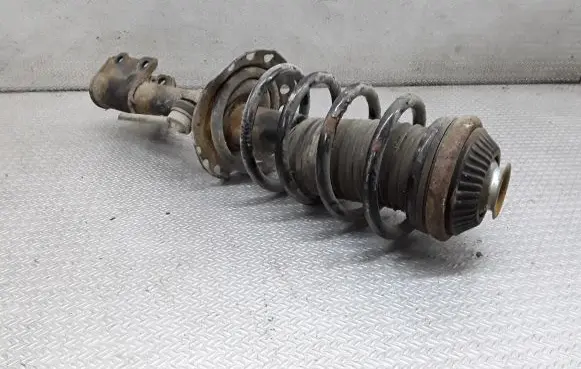 Front shock absorber with coil spring