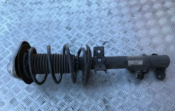 Front shock absorber with coil spring