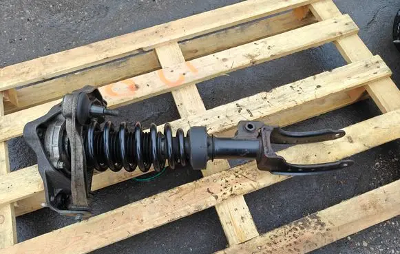 Volkswagen Touareg I Front shock absorber with coil spring 7L6412022M