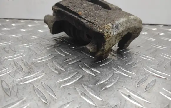 Volkswagen Golf V Front brake caliper